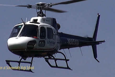 Medevac copter taking off from Schenectady High School